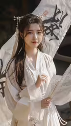 a woman in an oriental costume with writing and a fan,an asian girl is dressed in white holding a book