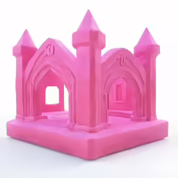 a pink castle made of foam sits on a white surface
