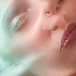 a woman laying down and looking into the distance