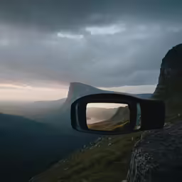 a video camera lens is in place to capture a beautiful sunset