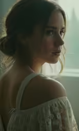 the woman is looking off to the right