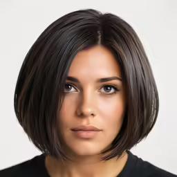 a beautiful young woman with a short brown bob