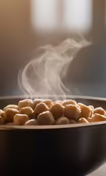 a bowl filled with food sitting on top of a table