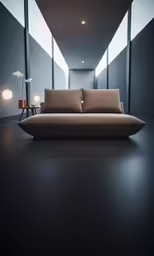 a modern sofa sits next to a tall window