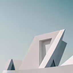 some white architecture is against the blue sky
