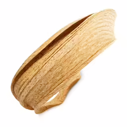a piece of wood sitting on top of a white surface