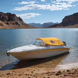 a boat parked at the shore of a mountain lake