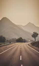a person riding a motorcycle on a rural road