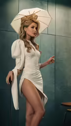 the woman is posing in a white dress