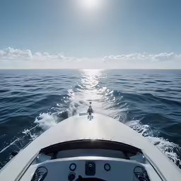 a person is riding on a boat in the ocean