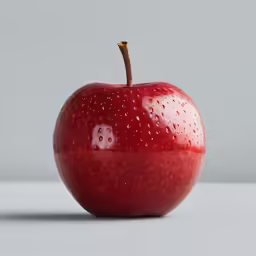 an apple is partially closed on the surface