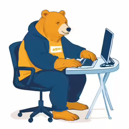 the bear is using his laptop on the table