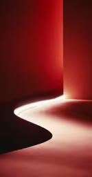 a dark room with an area made of concrete