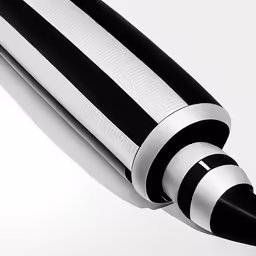a pen is seen with black and white stripes on it