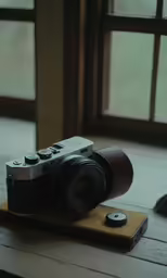 an image of a digital camera with two glasses on it