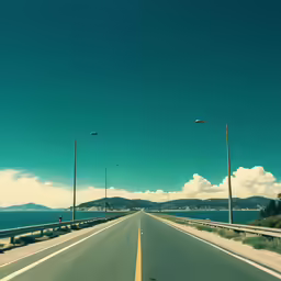 an empty freeway with three lights on each side