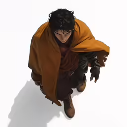 a person that is wearing a large blanket