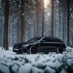 an suv driving through snow - covered woods in the winter