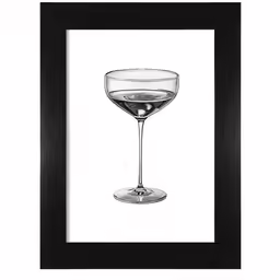 a wine glass with a drink sitting on top of it