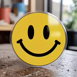 a happy smiley face sitting on a table