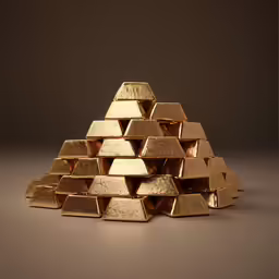 pile of gold nuggets on a plain background