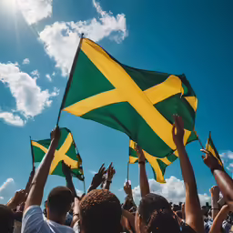 a group of people holding green and yellow flags