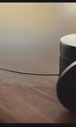 a picture of an old camera and its cord