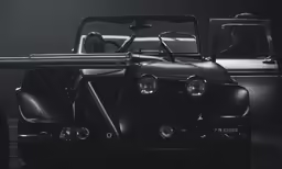 a black and white photo of an automobile