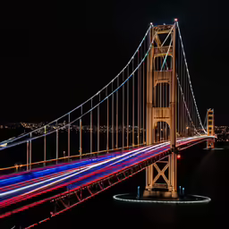 a photo taken at night of the golden gate bridge