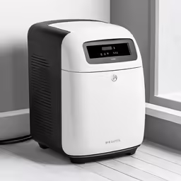 a modern generator sits beside a wall in a white room