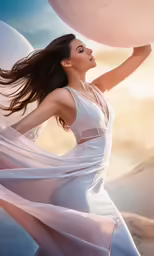 a woman standing on a hill holding a ball
