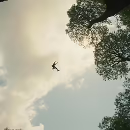 a person that is flying in the sky