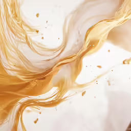 a liquid flowing from the top of a brush into liquid