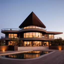 an exterior shot of a modern style house at night