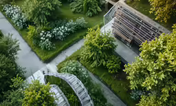 a park with lots of plants and benches