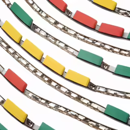 a bunch of different color trains on track