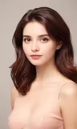 a girl wearing an open breast poses for the camera