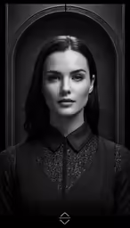 a woman in a blouse is posing for a black and white picture