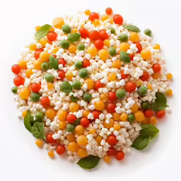 a white plate topped with different colored and colorful sprinkles