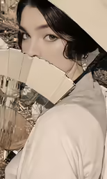a lady with a large umbrella with her mouth open