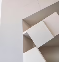 a photo taken from below of a square on the ceiling