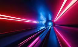 colorful lines streak through a large tunnel