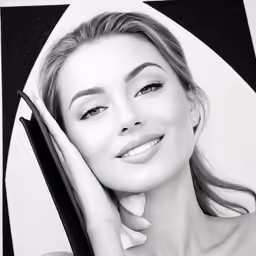a beautiful blonde woman posing with a mirror