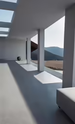 the back wall of a building with columns and seating