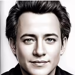 the man is posing for a black and white photo