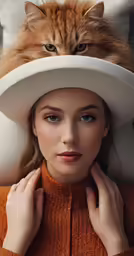 a woman wearing a white hat and a cat on her head