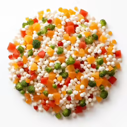 several small pieces of fresh vegetables sit together