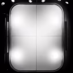 a mirror with several lights on a wall