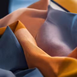multiple colored ribbons laying next to each other