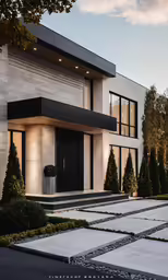 a modern, sleek, home is photographed at dusk